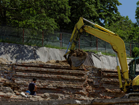 the excavator working on a construction siteの写真素材