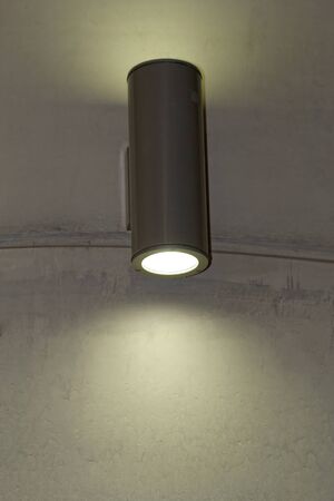 designer lamp on the wall with soft lightの写真素材
