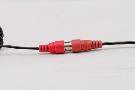 correct conection between left - right audio RCA cable on a white background (red white)の写真素材