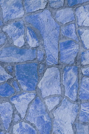 Background of a large stone wall texture (blue)の写真素材