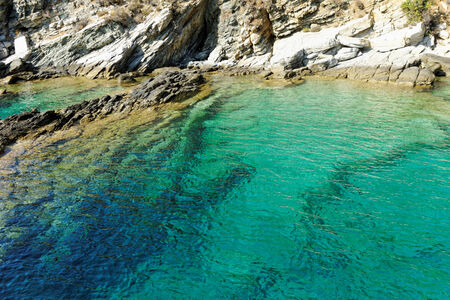 rocky beach with turquoise sea in greece thassos islandの写真素材
