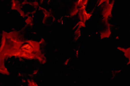 glowing embers in hot red colorの写真素材