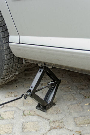 Car lifting for service with handlifterの写真素材