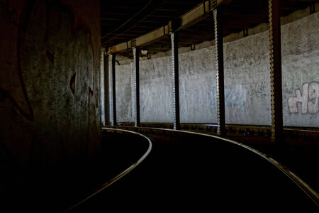 rail tunnel with graffitiの写真素材