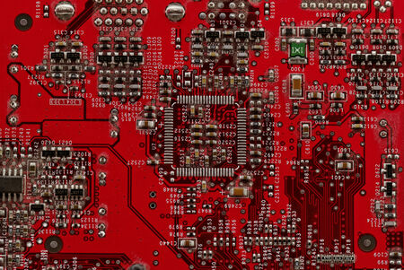 Close up photo of a red printed circuitの写真素材