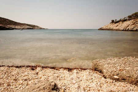 rocky beach with turquoise sea in greece thassos islandの写真素材