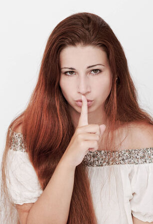 Beautiful young woman with long hair posingの写真素材