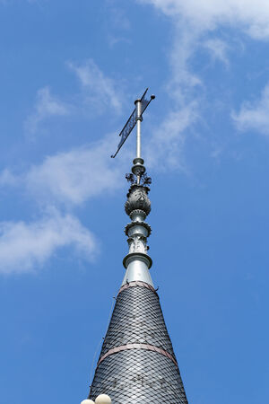 Photo of a high steeple, background is the blue skyの写真素材