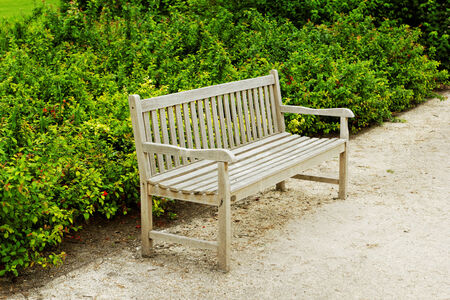 Photo of an old bench in the park の写真素材