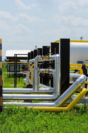 industrial pipes at an oil wellのeditorial素材