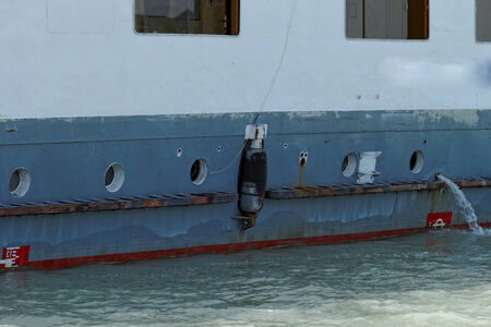 Photo of an old and rusty ship's sideの写真素材