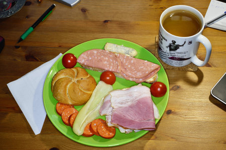 A hearty breakfast for the IT expert in the office.の写真素材