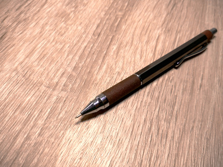 a pencil on wood tableの写真素材