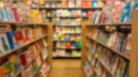 Blur in Book store on shelf of shopping mall for background usage.の写真素材
