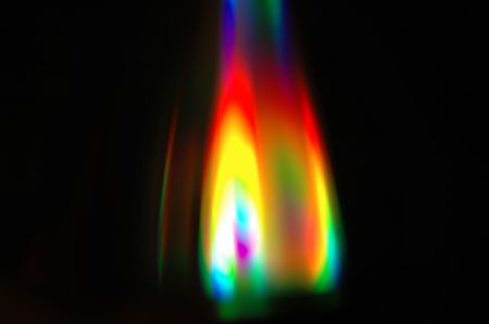 Flame in rainbow colorsの写真素材