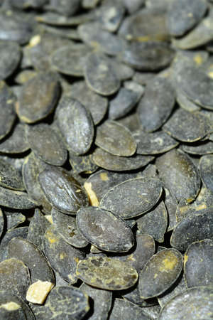 Close up of pile of peeled pumpkin seeds