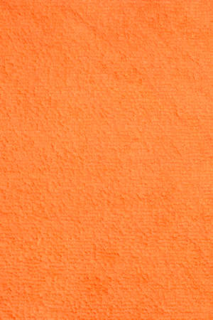 Detail of an orange microfiber clothの写真素材