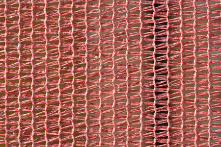 Detail of red scaffold debris net textureの写真素材