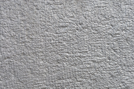 Detail of a silver painted rough wall