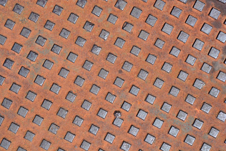 Close up detail of a manhole coverの写真素材
