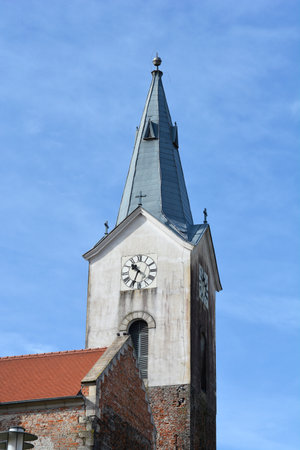 The bell tower of the Church of St. Mary Magdalene in Cazma, Croatia