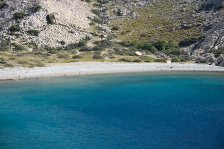Gravel beach in the Vela Draga bay on the island Krk, Croatiaの写真素材