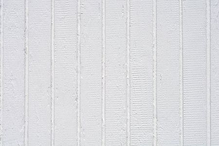 Detail of a white painted wooden fence