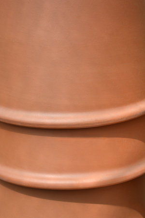 Close-up detail of upside down empty terracotta flower pots