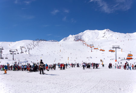 Crowd of skiers and chairlifts in Alpine ski resort in Solden in Otztal Alps, Tirol, Austriaのeditorial素材