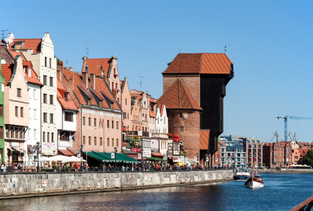 GDANSK, POLAND - AUGUST 8, 2015: Gdansk old city in Poland with the oldest medieval port crane...