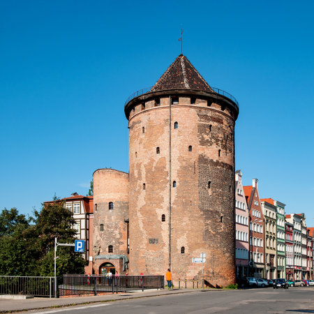 GDANSK, POLAND - JULY 15, 2014: Stagiewna Gate and tower in Gdansk, Poland. Old fortification built...