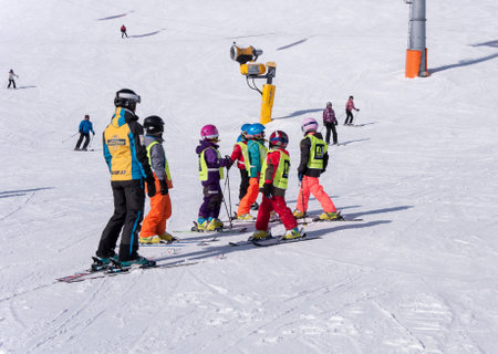 SOLDEN, AUSTRIA, MARCH 4, 2016: Ski school for children in Solden ski resort in Austrian Alpsのeditorial素材