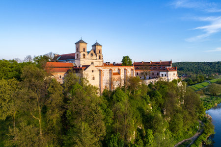 Benedictine monastery on the rocky hill in Tyniec near Cracow, Poland and Vistula River. Aerial view at sunsetのeditorial素材