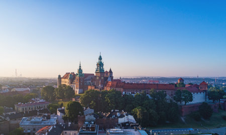 Krakow, Poland. Skyline panorana with historic royal Wawel castle and cathedral.  Aerial view in sunrise lightのeditorial素材
