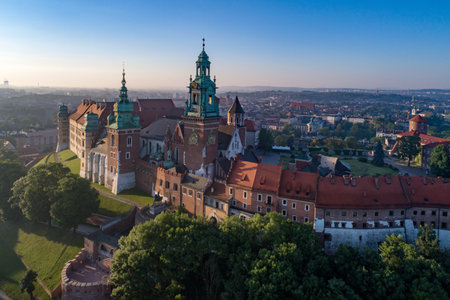 Historic royal Wawel castle and cathedral in Krakow, Poland  Aerial view in sunrise lightのeditorial素材