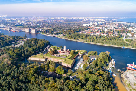 Medieval Wisloujscie Fortress with old lighthouse tower in port of Gdansk, PolandA unique monument of the fortification works. Aerial viewのeditorial素材