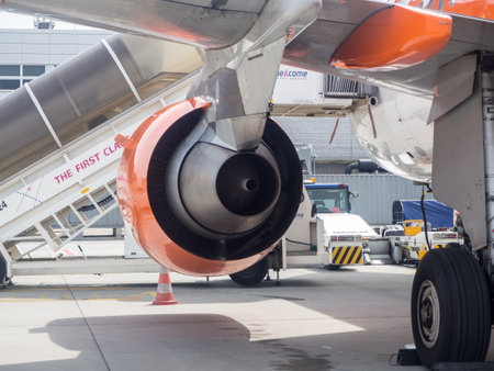 Krakow, Poland - June 6, 2017: Exhaust of the Rolls_Royce  jet engine, pylon, wing , landing gear of...