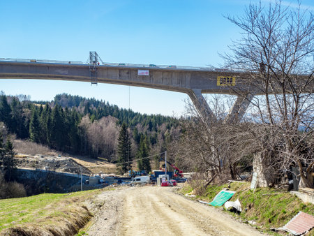Skomielna Biala, Poland - March 27, 2019: New highway in national road no 7, E77, called zakopianka, under construction. The viaduct over  the village Skomielna-Biala.のeditorial素材