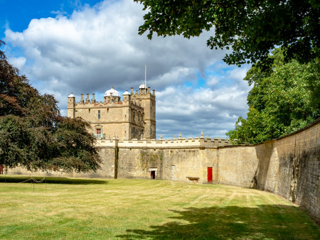 Bolsover castle in Derbyshire, England, UK. Partly ruined. Built in 17th century on the remnants of the 12th century medieval castle. Popular tourist attraction. The keep, stone wall and treesのeditorial素材