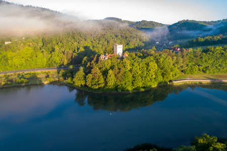 Medieval Tropsztyn castle in Lesser Poland by the Dunajec river. Aerial view in sunrise light.の写真素材