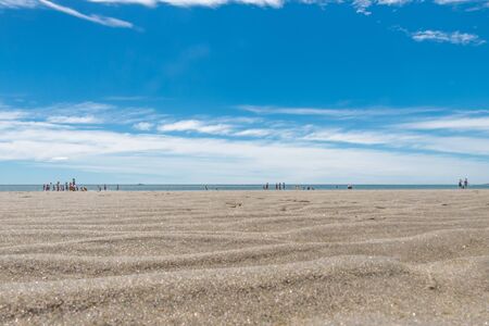 Puerto Madryn beach, sun, waves and sand, beautiful day.の写真素材
