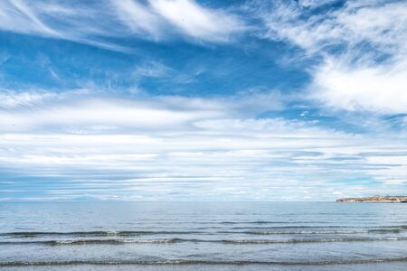 Puerto Madryn beach, sun, waves and sand, beautiful day.の写真素材