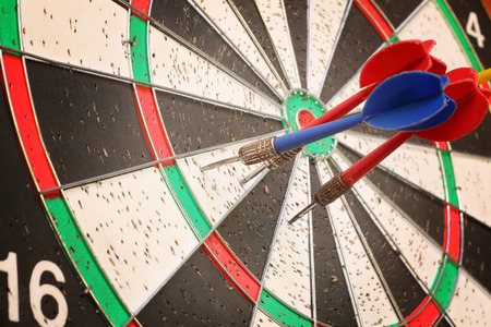 arrows darts hit the target on a  background
