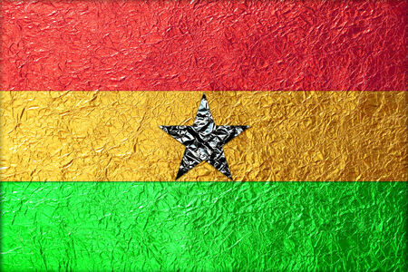 Ghana Flag with a Shiny  leaf  Bronze Shiny  leaf   foil texture backgroundの写真素材