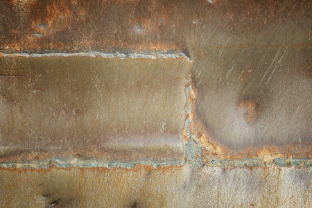 welding seam old iron background