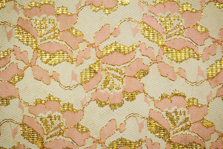 gold guipure, embroidery on cloth textureの写真素材