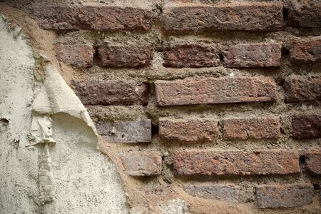 cracked concrete vintage wall background, old wall . Textured backgroundの写真素材