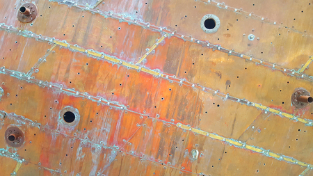 Aged copper plate texture with green patina stains. Old worn metal background.