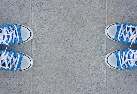 pairs of sneakers on marble backgroundの写真素材