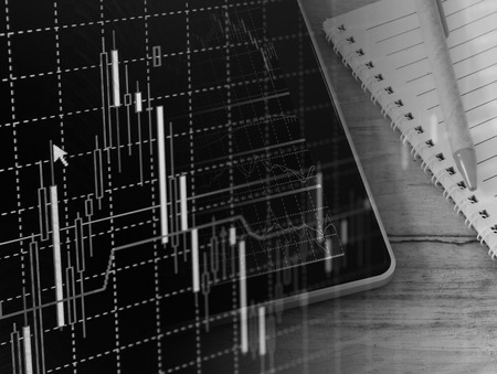 Analysis colorful stock chart on monitor. finance concept.の写真素材